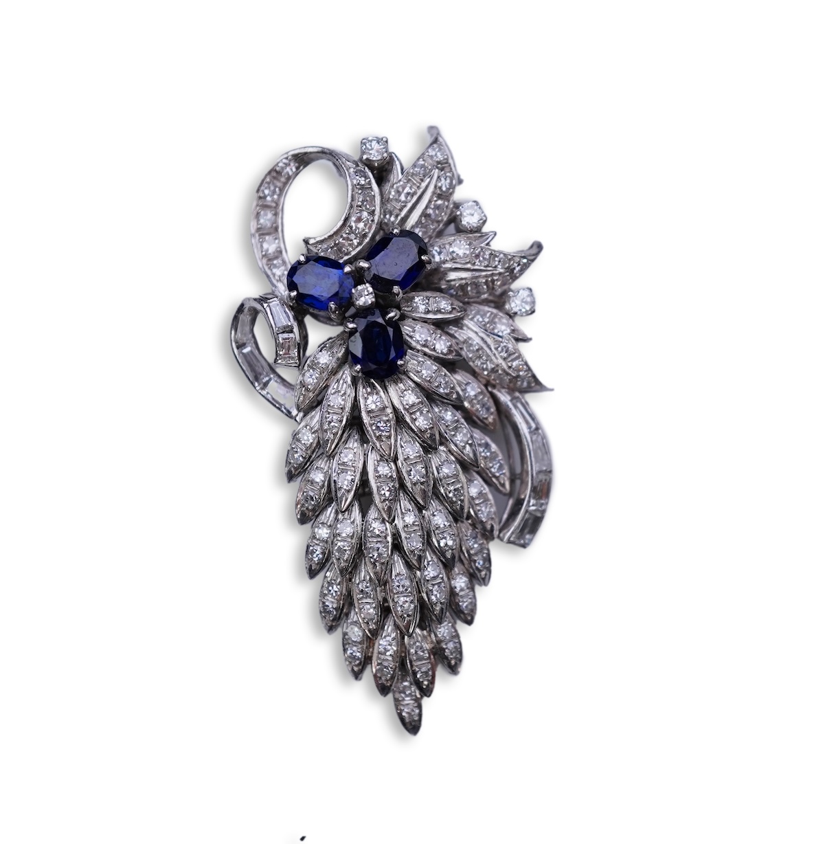 A sapphire and diamond brooch, mid 20th century
